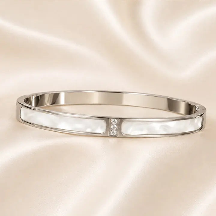 Celeste White Enamel Bangle with glossy enamel inlays and crystal accents in polished Stainless Steel finish.