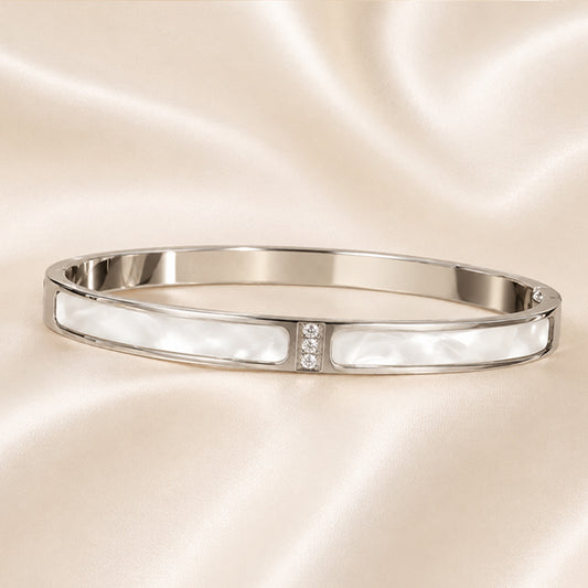 Celeste White Enamel Bangle with glossy enamel inlays and crystal accents in polished Stainless Steel finish.