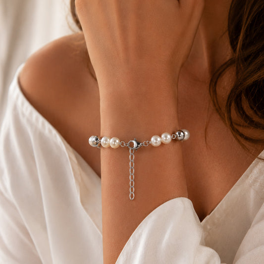Pearl-like titanium chain bracelet worn on wrist