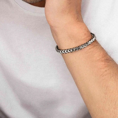 Stainless steel curb chain men’s bracelet with black thread detail and adjustable sliding closure