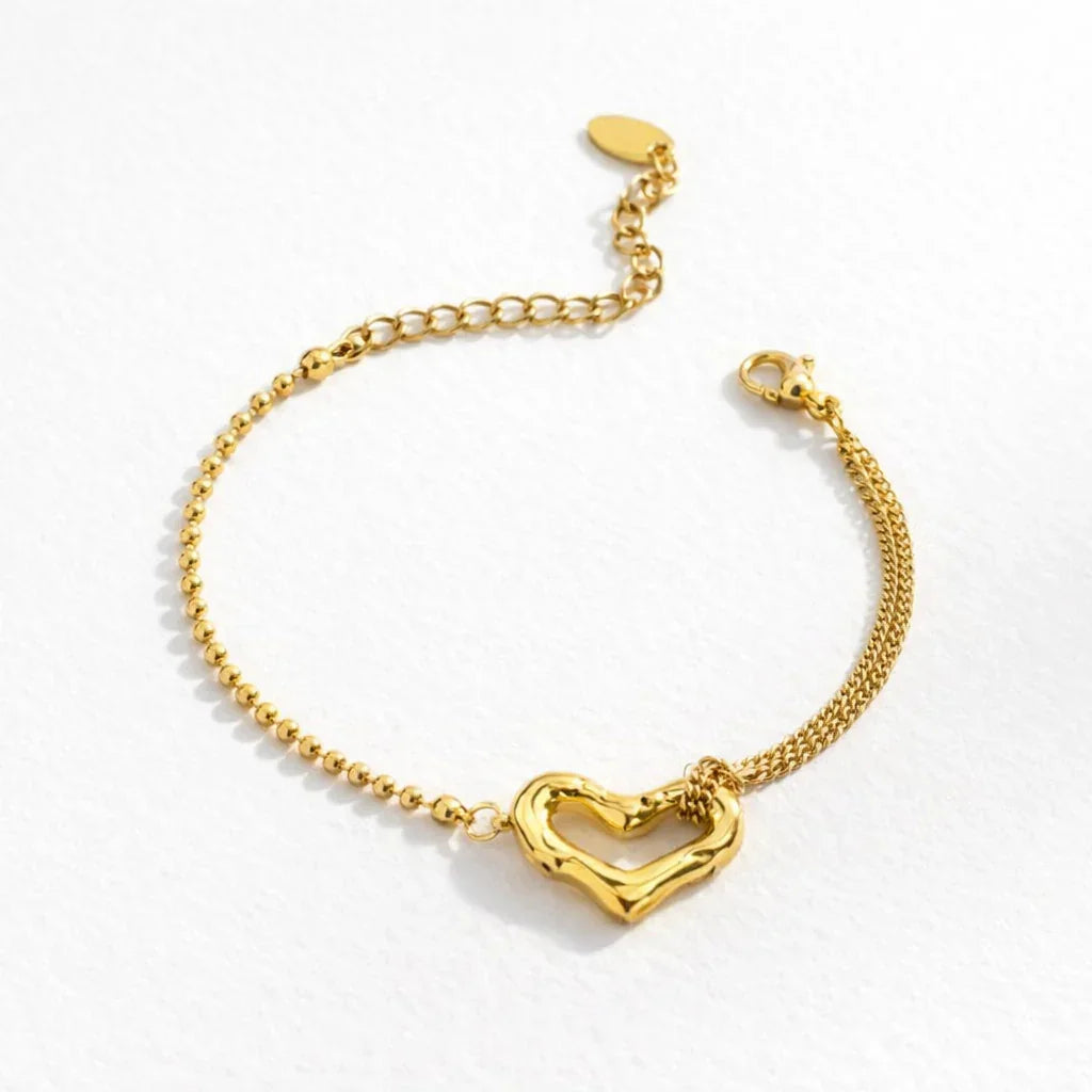 Sculpted heart chain bracelet product view with adjustable chain, PVD gold plating